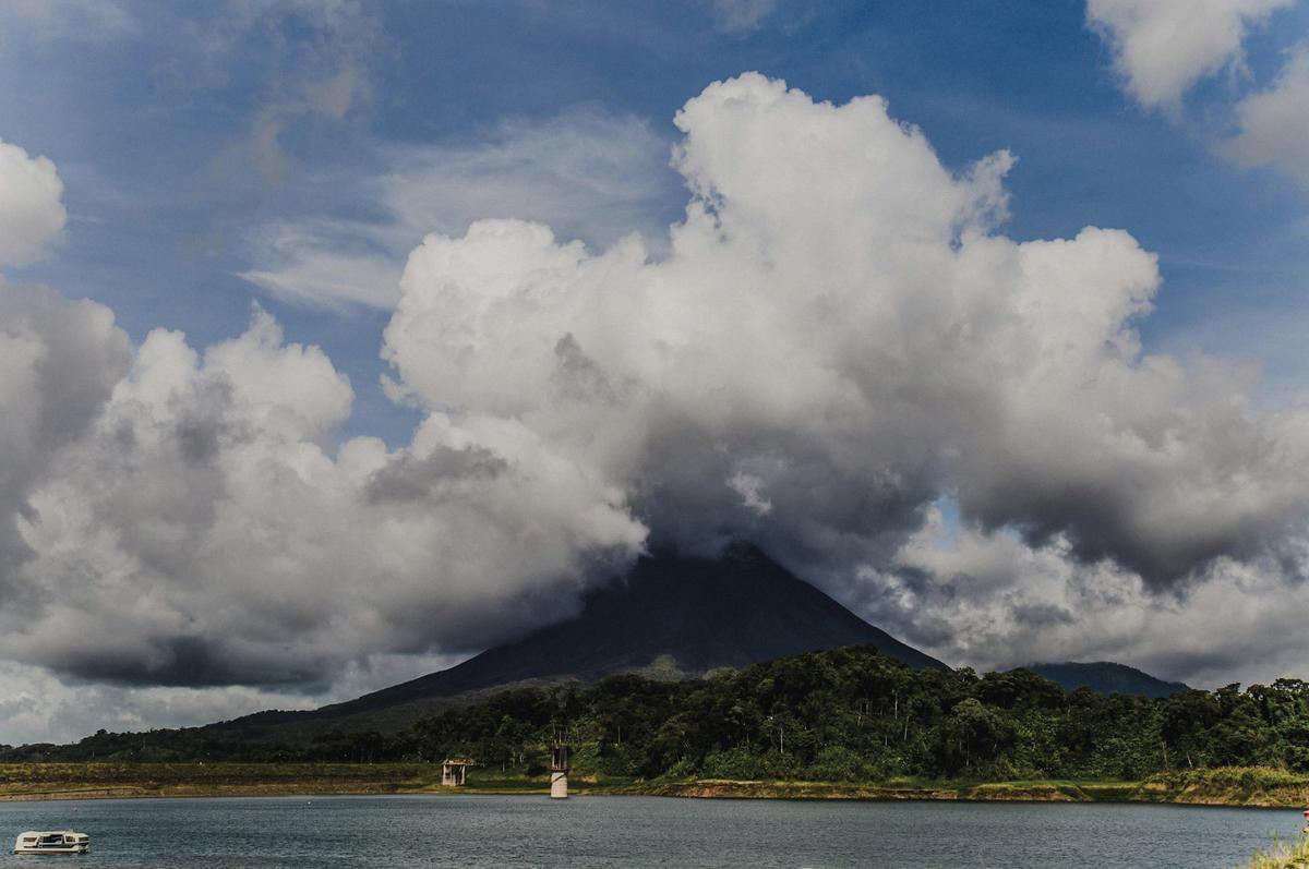 A volcano surrounded by a lake 