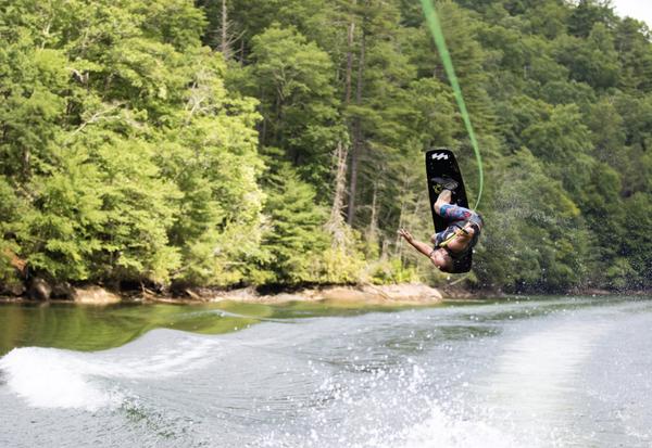 person using wakeboard during daytime